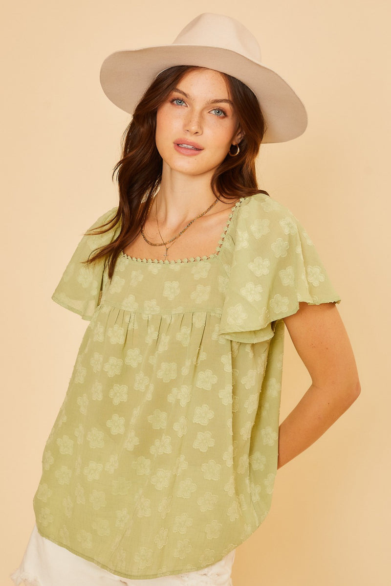 green floral blouse